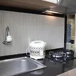 Minimalist Studio Gateway Apartement Ahmad Yani Cicadas By Travelio