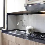 Minimalist Studio Gateway Apartement Ahmad Yani Cicadas By Travelio